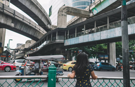 bangkok-girl-looking-at-traffic-cover
