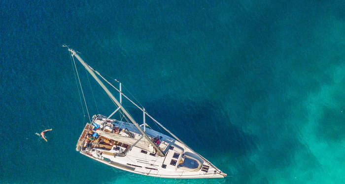 sailing-maldives-aerial-sailing-boat-cover