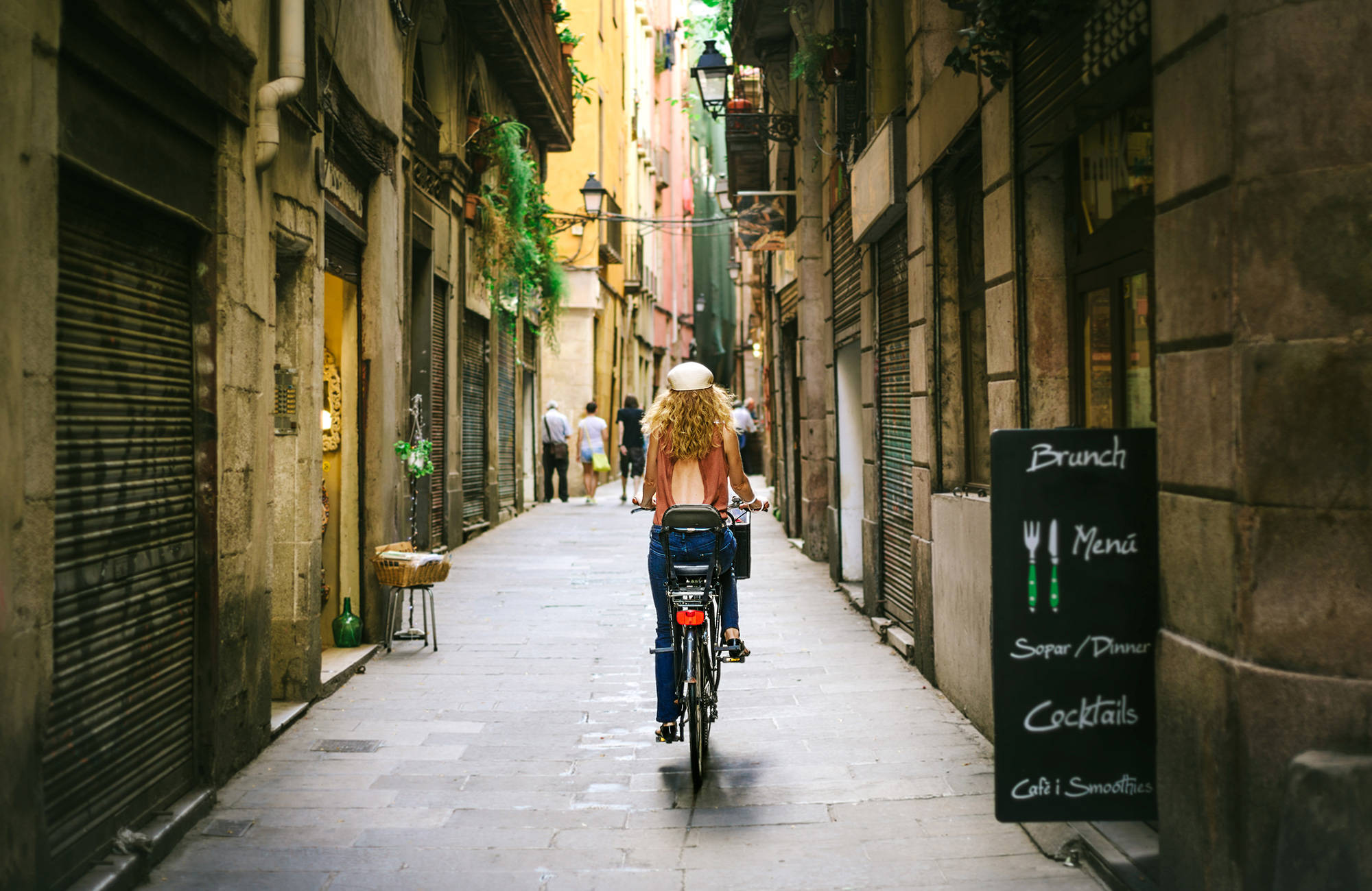 spain-barcelona-woman-biking