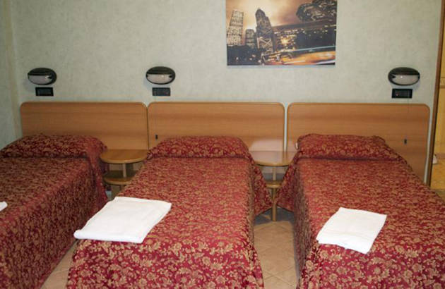 soveværelse på Hotel Ferrarese i rom