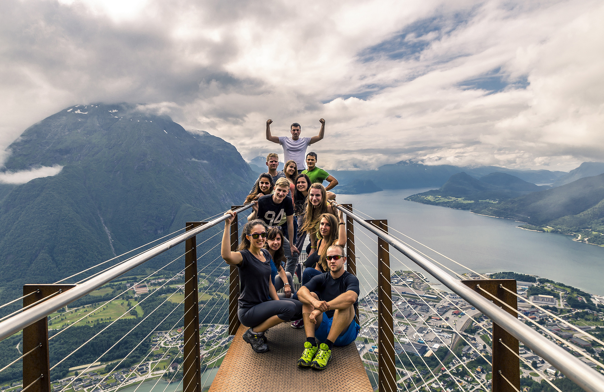 group-travel-group-on-the-mountain-top-alesund-norway