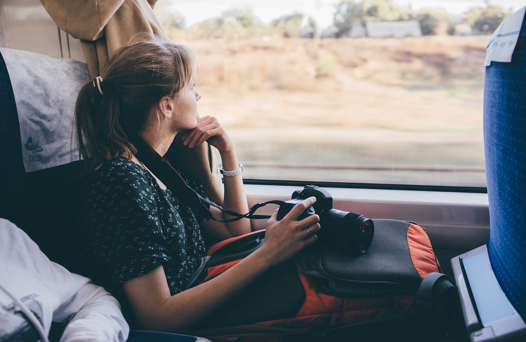 Interrail Woman Enjoying View From Train Seat